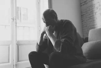Depressed overwhelmed old man